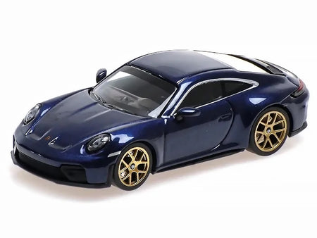 Blue sports car with gold wheels.