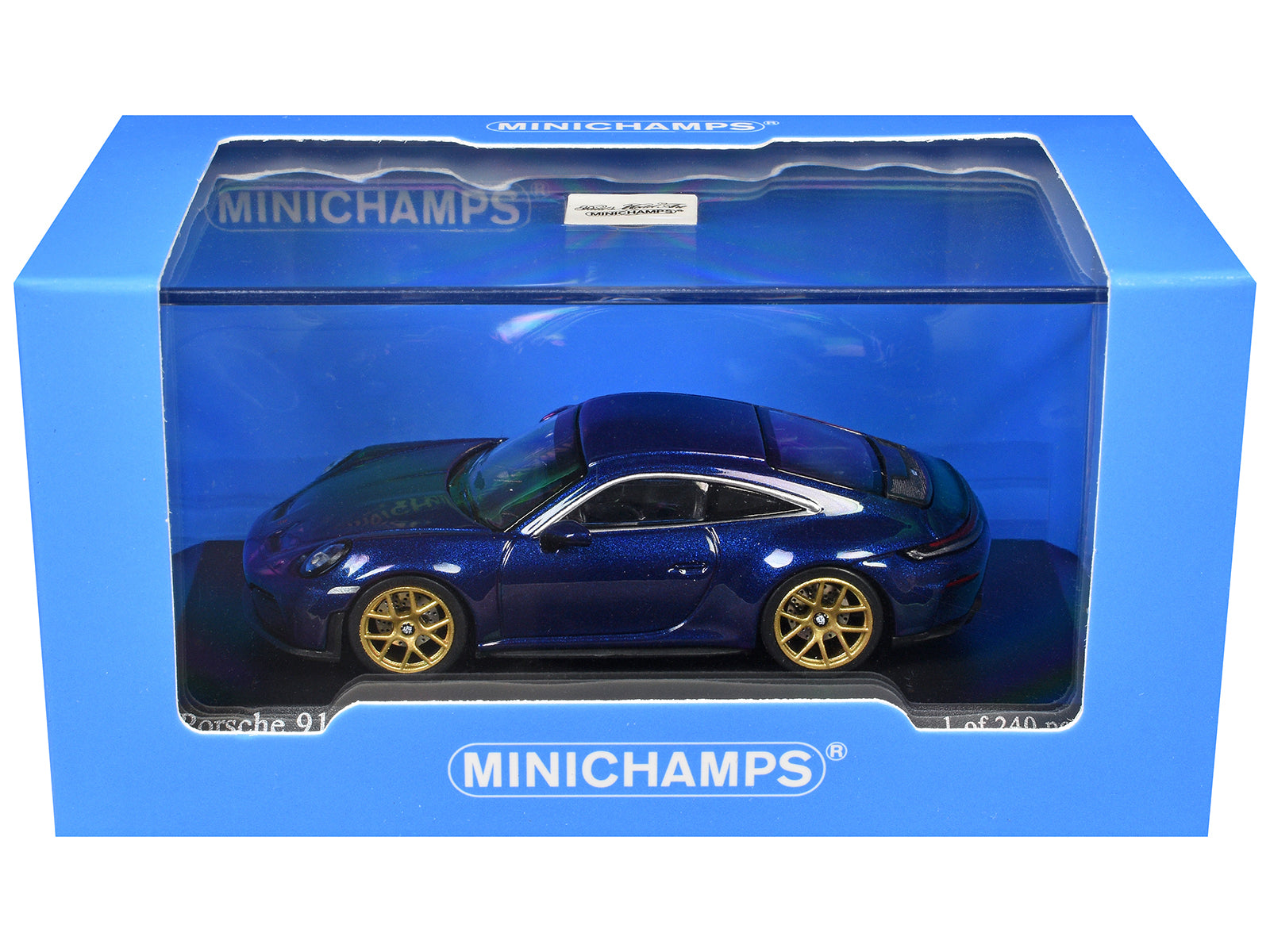 Blue toy car in box