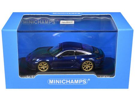 Blue toy car in box