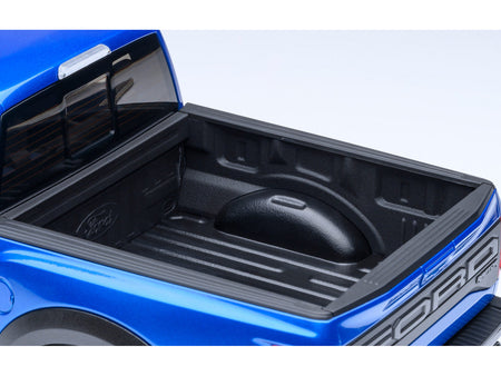 Blue Ford truck bed.