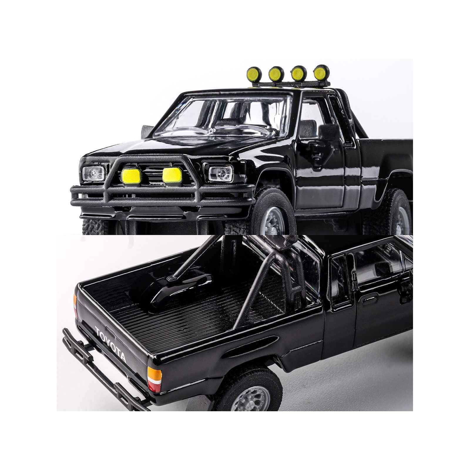 Black toy pickup truck with lights.