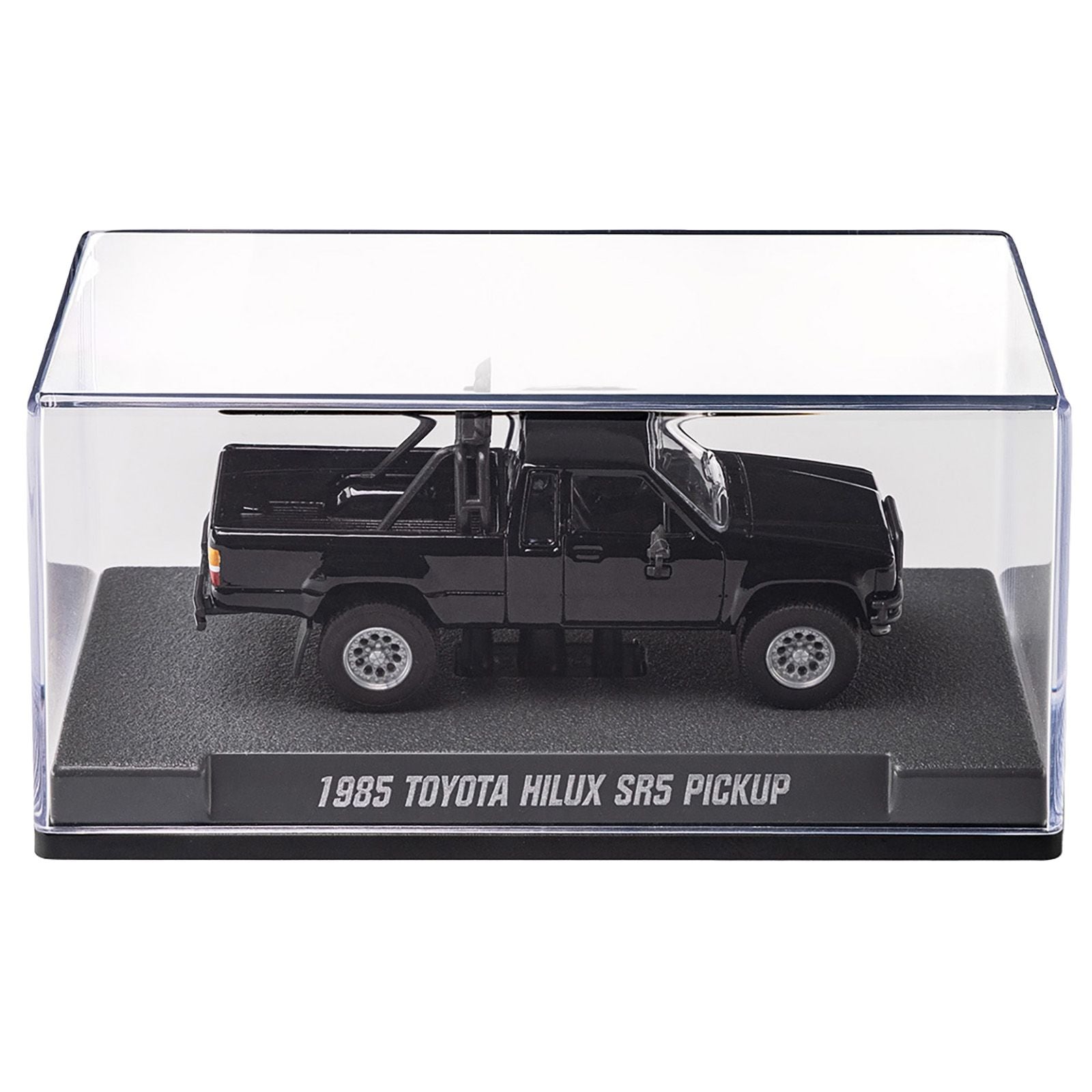 Black toy truck in a clear display case.