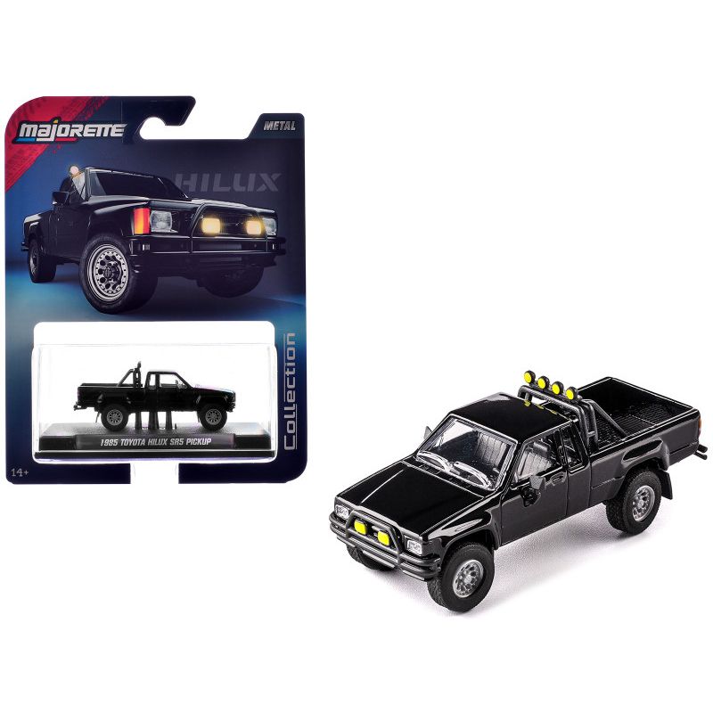 Toy black pickup truck with packaging.