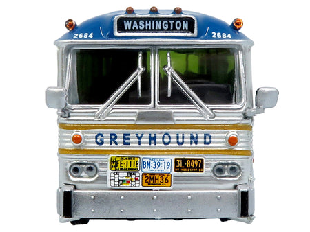 Model Greyhound bus with Washington sign.