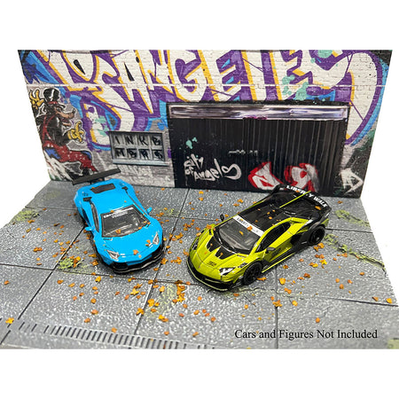 AD-2424MJ-3 miniature cars in front of graffiti garage.