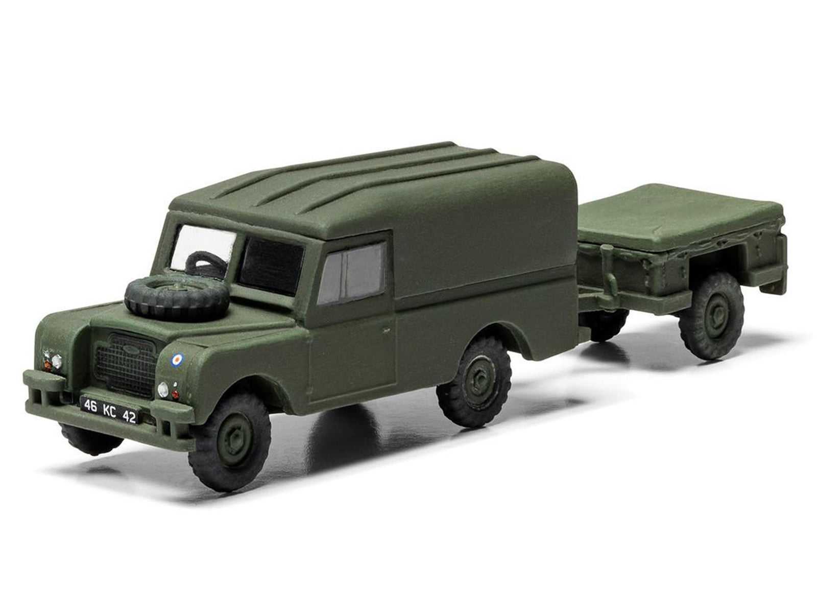 Green Land Rover model with trailer