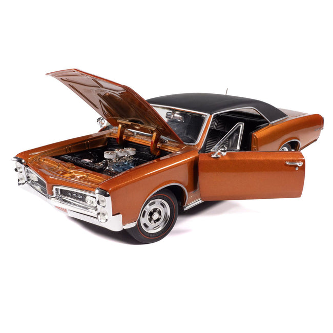1966 Pontiac GTO Copper Blaze Metallic with Black Vinyl Top "Hemmings Muscle Machines July 2024 Cover Car" "American Muscle" Series 1/18 Diecast Model Car by Auto World