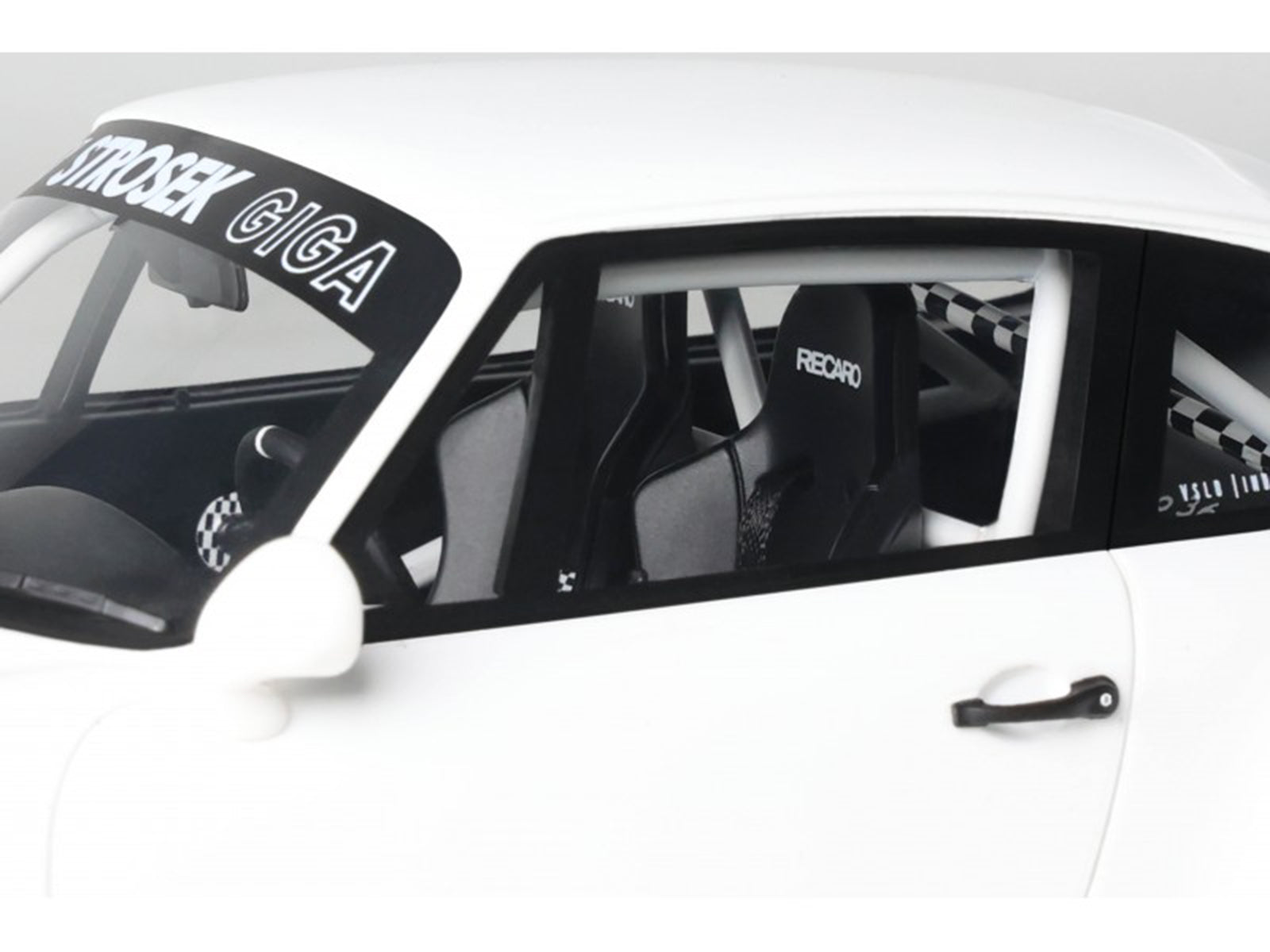 GT525-3 Porsche with Recaro seats and STROSEK GIGA banner.