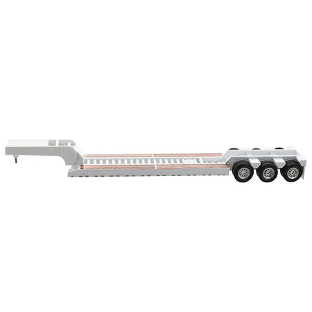 White lowboy trailer with triple axle