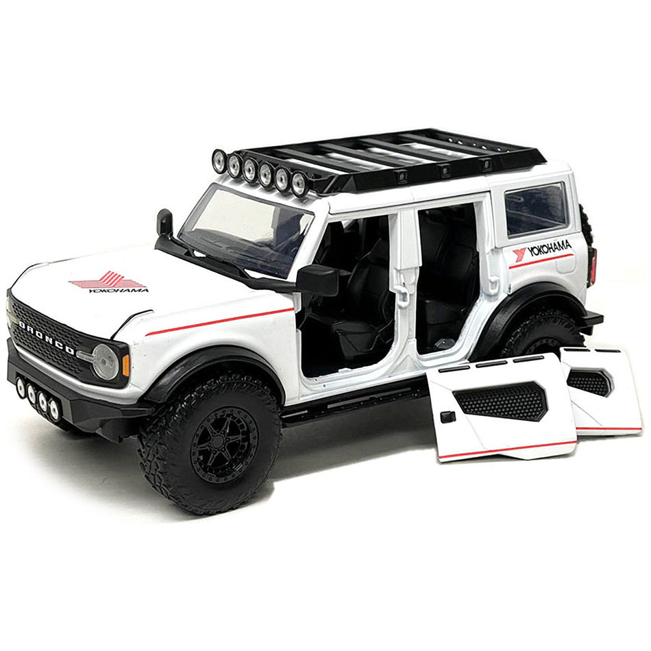 2021 Ford Bronco White with Red Stripes and Roof Rack "Yokohama Tires" "Just Trucks" Series 1/24 Diecast Model Car by Jada