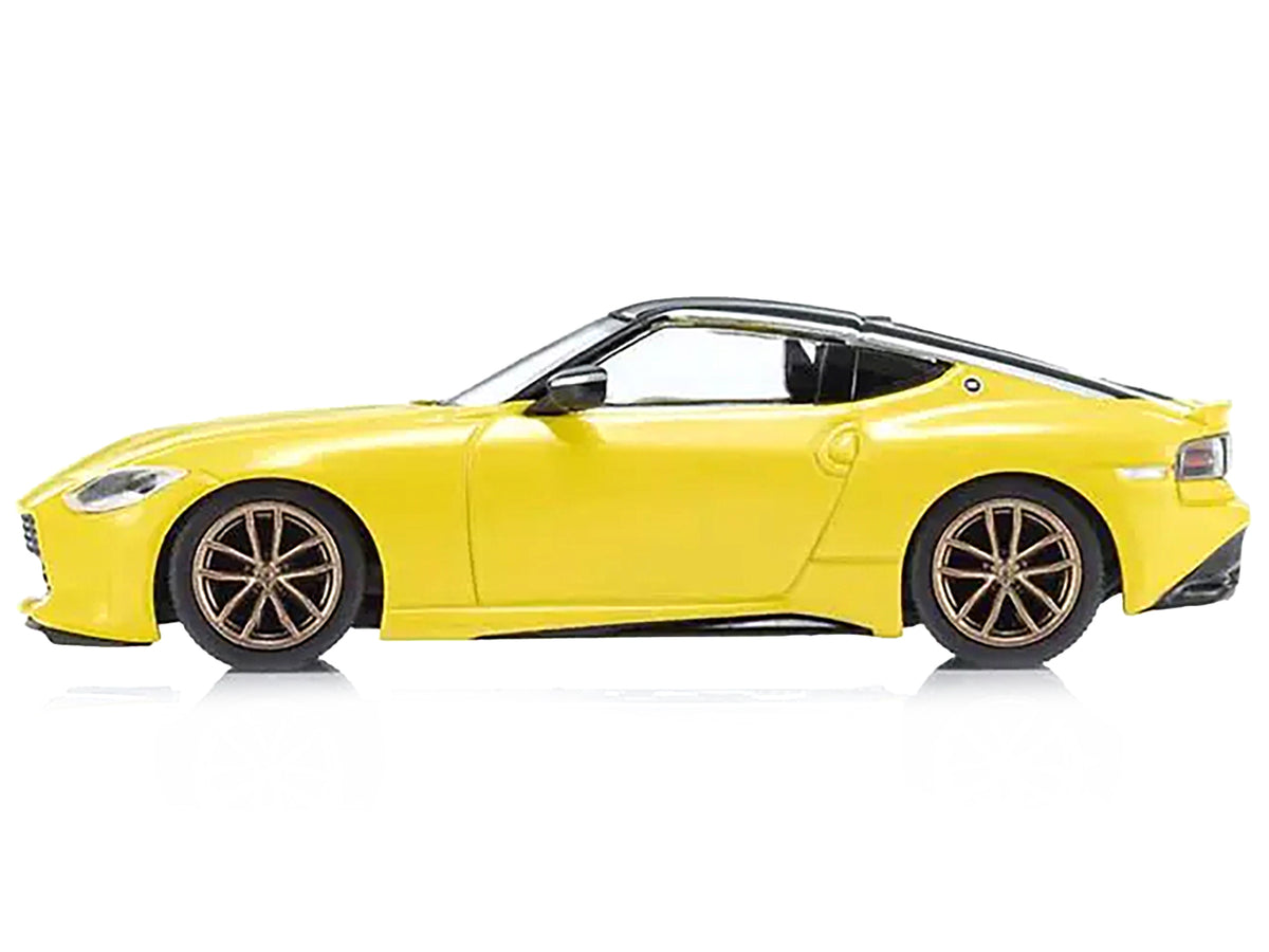 Nissan Fairlady Z RHD (Right Hand Drive) Ikazuchi Yellow with Black Top with Mini Book No.13 1/64 Diecast Model Car by Kyosho