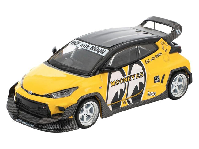 Pandem GR Yaris RHD (Right Hand Drive) "MoonEyes" Yellow with Black Top and Graphics "Enigma Exclusive Edition 1/64 Die Cast Model Car by Pop Race