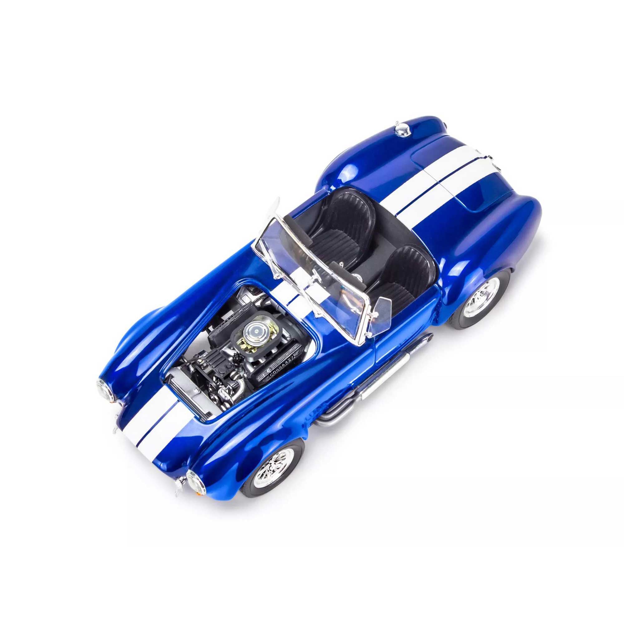 Blue toy Cobra sports car with white stripes