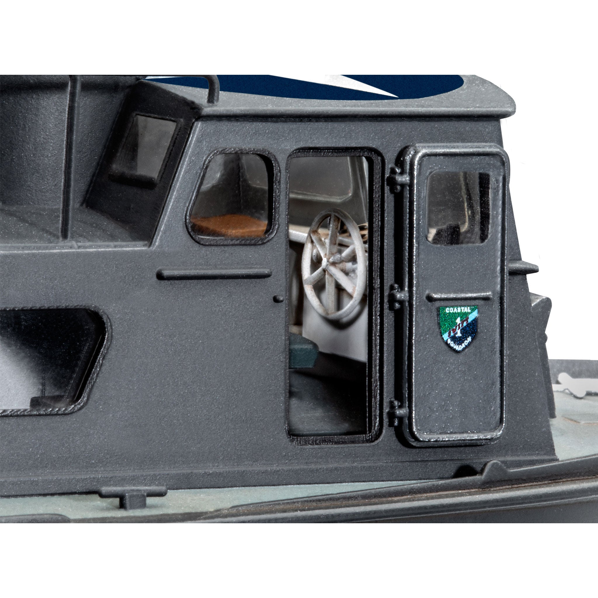 RMX850321 boat model detail with open door and steering wheel.