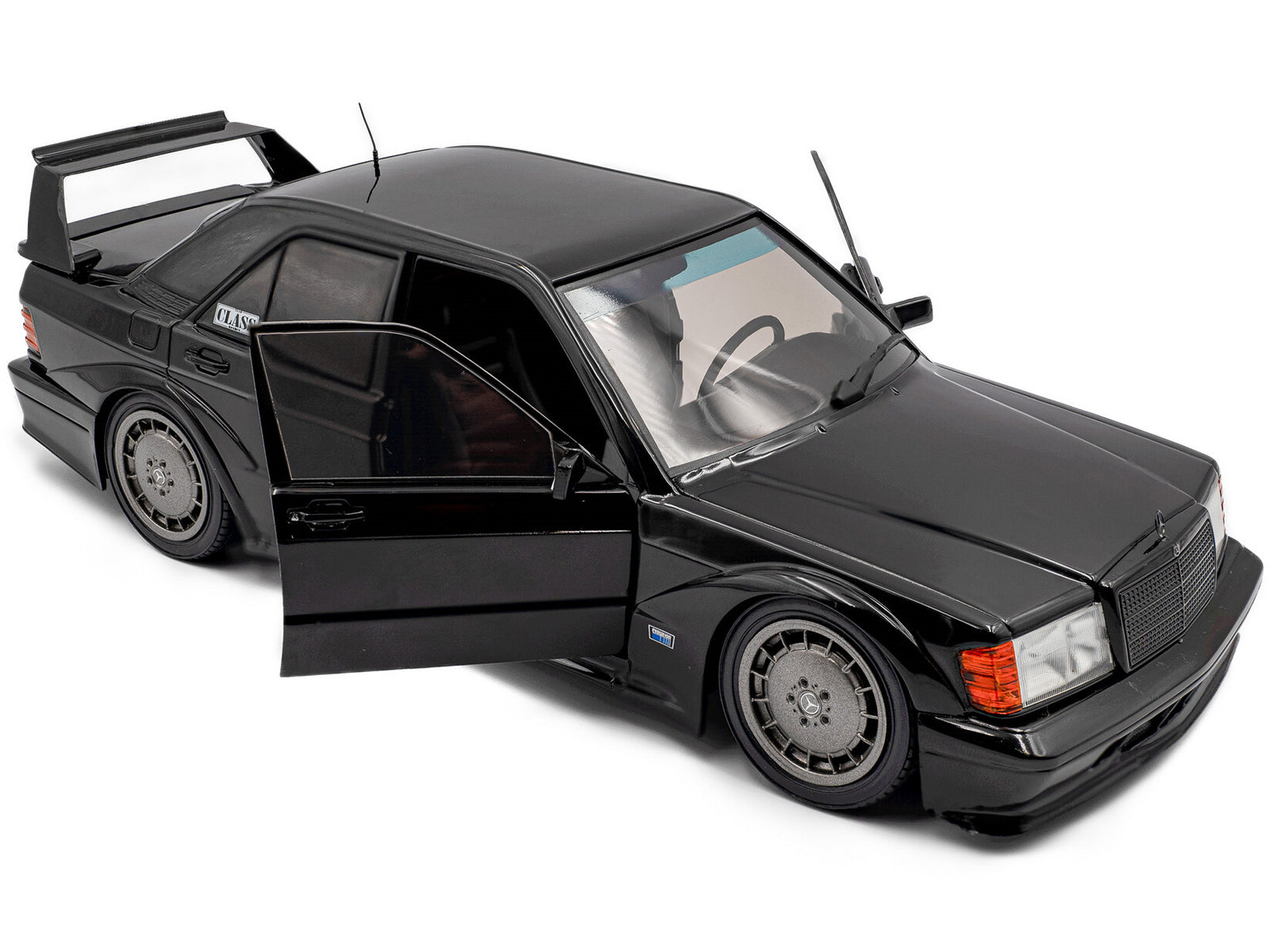 Black Mercedes-Benz model car with doors open