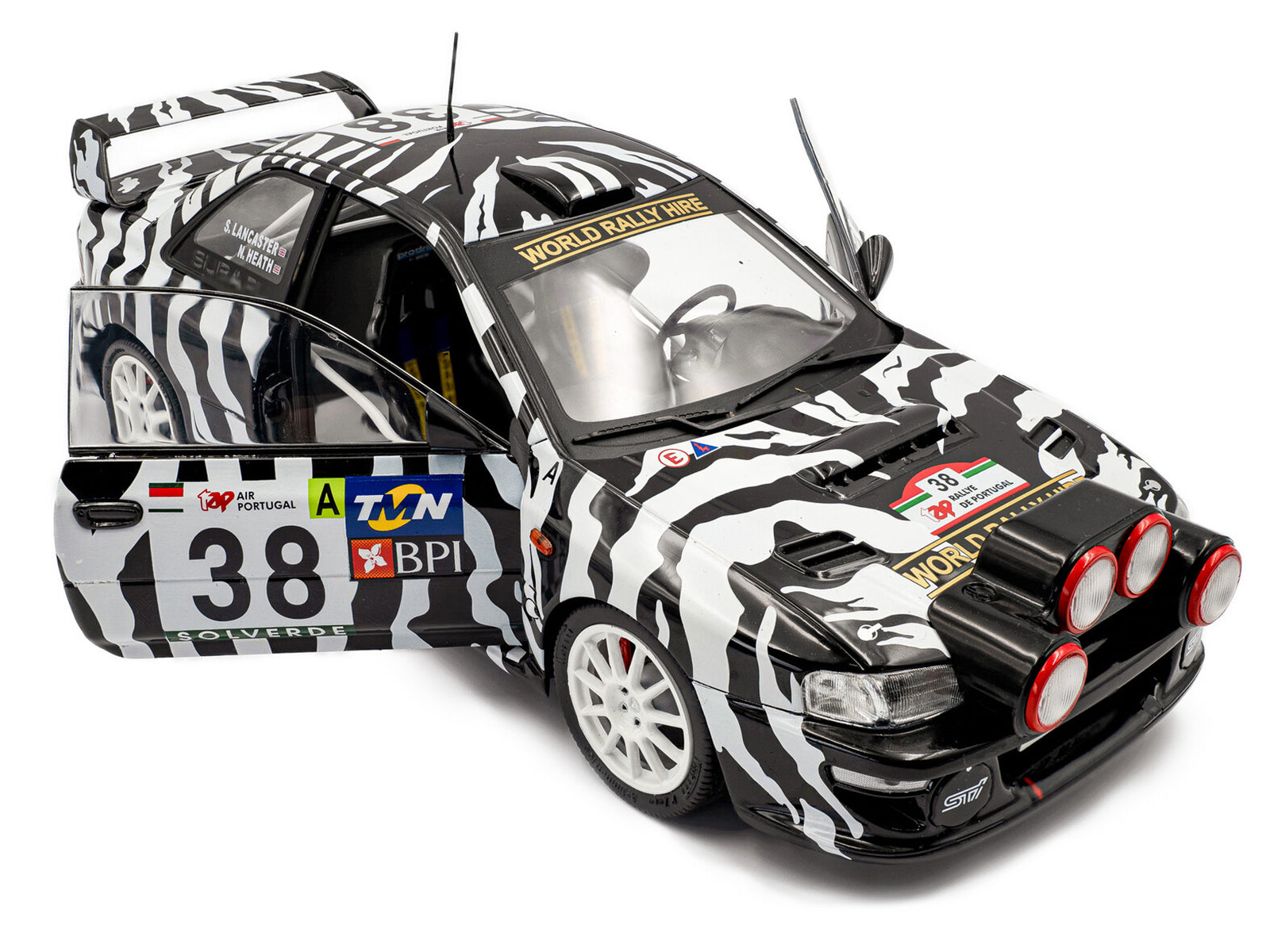 Zebra-striped rally car model S1807409-2__28243 with door open.