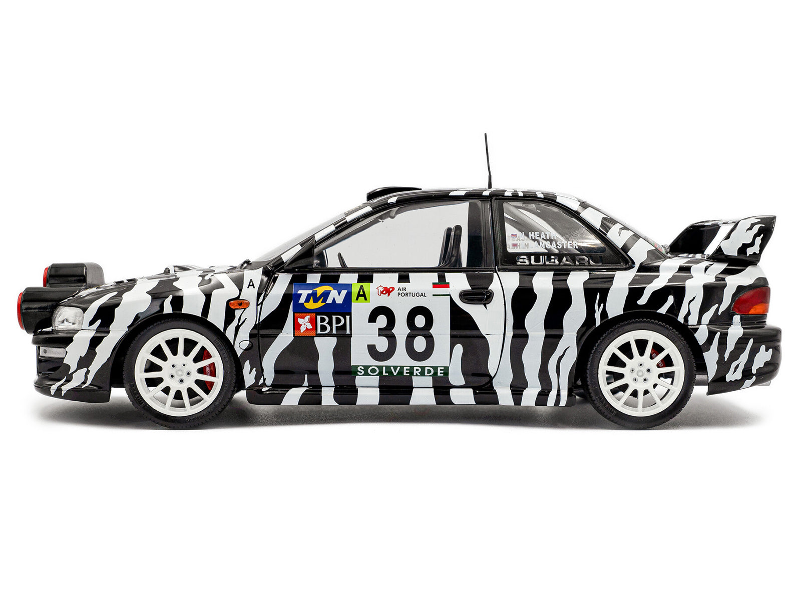 Subaru rally car S1807409-3 with zebra stripes, number 38