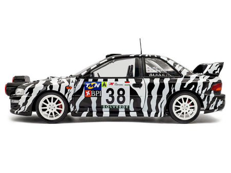 Subaru rally car S1807409-3 with zebra stripes, number 38