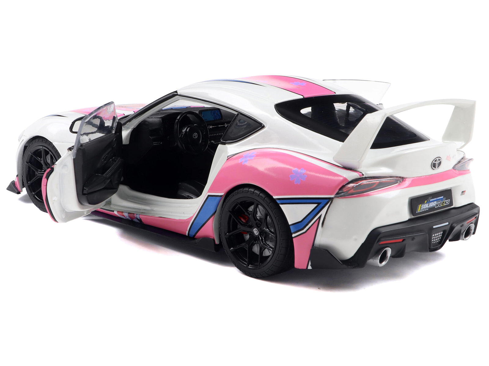 Toyota Supra model car with pink design