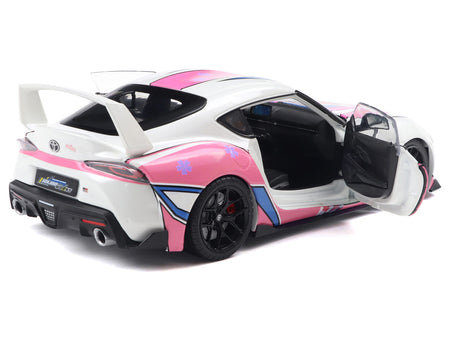 Toyota Supra model car with pink and white design
