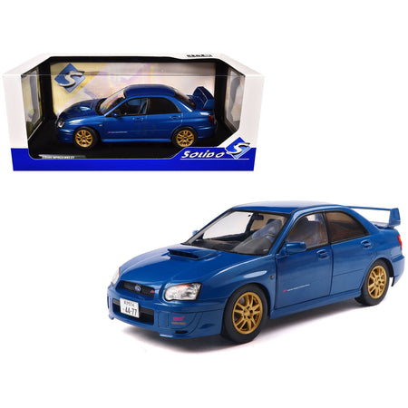 2003 Subaru Impreza WRX STI RHD (Right Hand Drive) Sonic Blue Metallic with Gold Wheels 1/18 Diecast Model Car by Solido