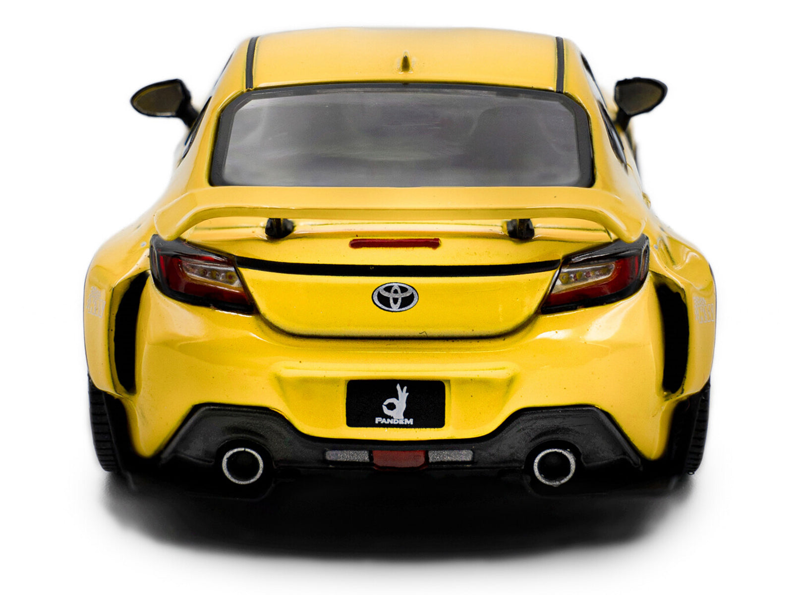 Yellow Toyota sports car rear view