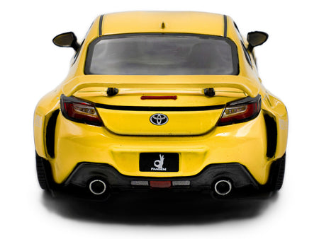 Yellow Toyota sports car rear view