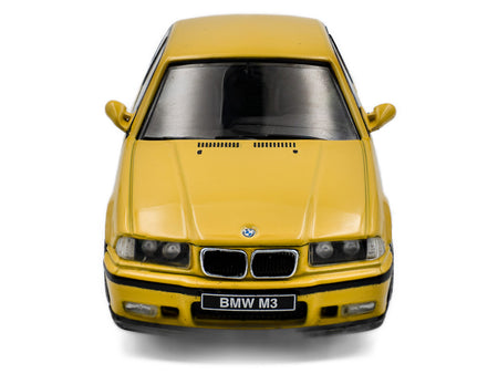 Yellow BMW M3 toy car