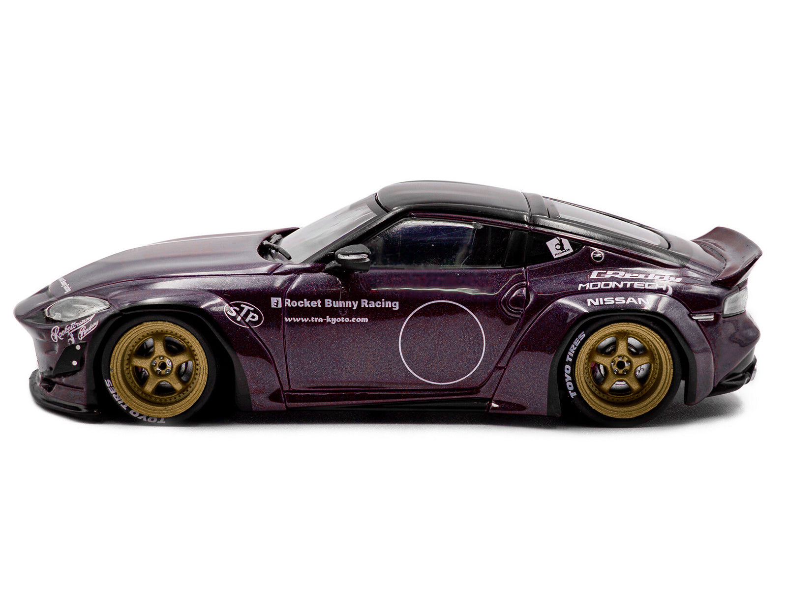 Purple Nissan 62200 model car with gold wheels