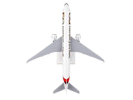 Boeing 777-300ER Commercial Aircraft with Landing Gear "Emirates Airlines - 50th Anniversary" (A6-EPO) White with Tail Graphics (Snap-Fit) 1/200 Plastic Model by Skymarks