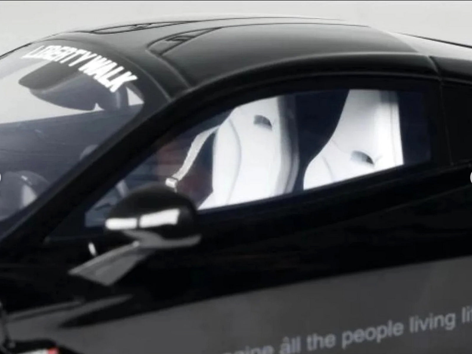 Black Liberty Walk car interior screenshot from Instagram