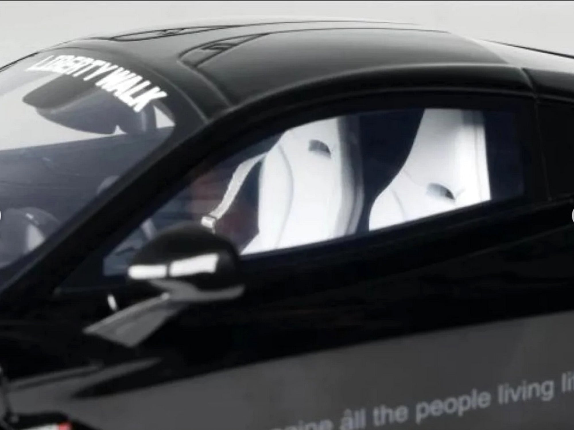 Black Liberty Walk car interior screenshot from Instagram