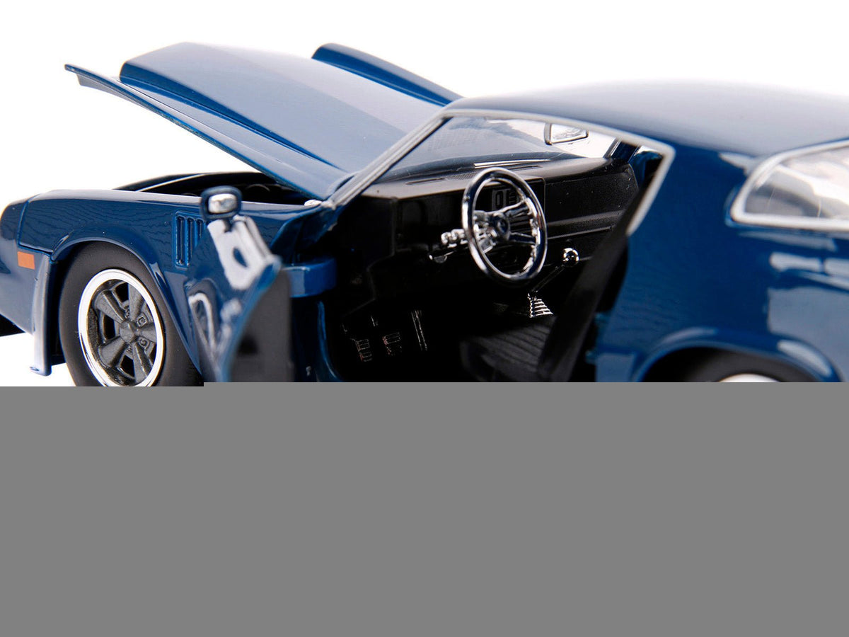 Billy's Chevrolet Camaro Z28 Dark Blue with Collectible Coin "Stranger Things" (2016) TV Series 1/24 Diecast Model Car by Jada-Jada-ModelCars.com