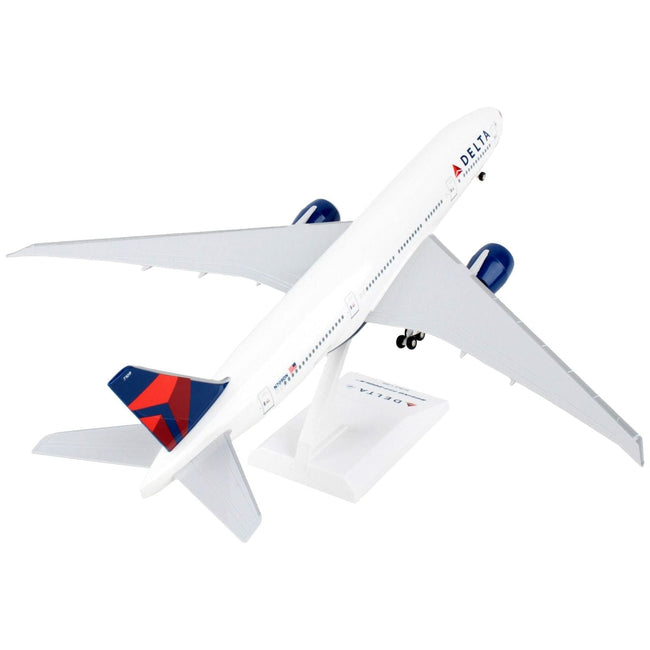 Boeing 777 - 200 Commercial Aircraft with Landing Gear "Delta Air Lines" (N709DN) White with Blue and Red Tail (Snap - Fit) 1/200 Plastic Model by Skymarks - Skymarks - ModelCars.com
