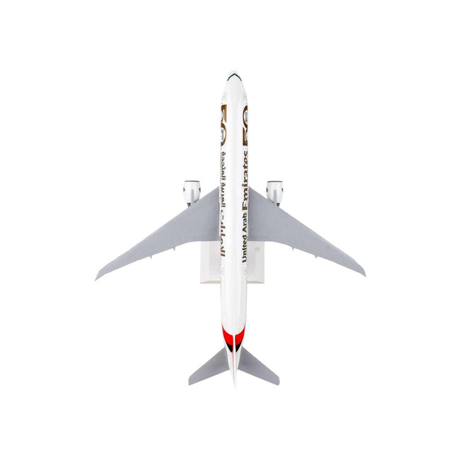 Boeing 777 - 300ER Commercial Aircraft with Landing Gear "Emirates Airlines - 50th Anniversary" (A6 - EPO) White with Tail Graphics (Snap - Fit) 1/200 Plastic Model by Skymarks - Skymarks - ModelCars.com