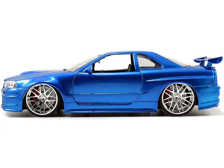 Brian's Nissan GTR Skyline R34 RHD (Right Hand Drive) Blue 25th Anniversary "Fast & Furious" Movie 1/24 Diecast Model Car by Jada-Jada-ModelCars.com