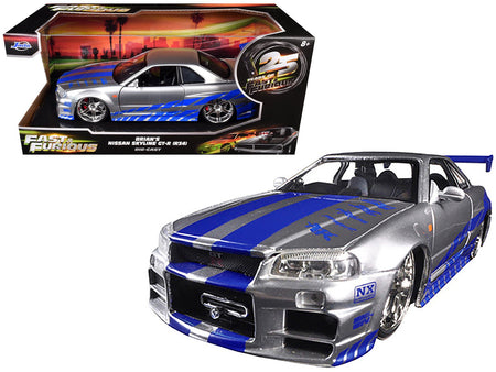 Brian's Nissan GTR Skyline R34 RHD (Right Hand Drive) Silver with Blue Stripes "Fast & Furious 25th Anniversary" 1/24 Diecast Model Car by Jada-Jada-ModelCars.com