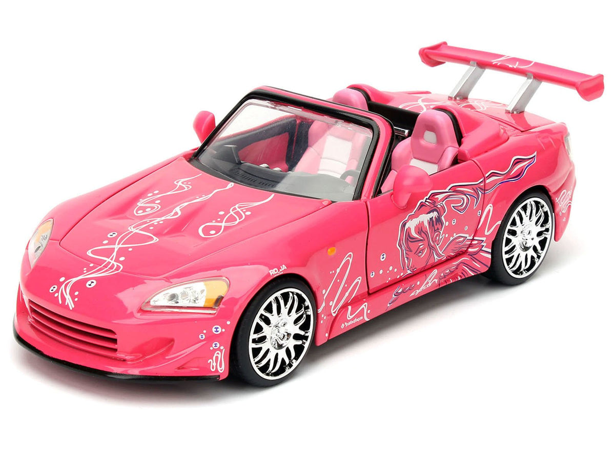 Brians Nissan Skyline GT-R (R34) Silver Metallic with Blue Stripes and Sukis Honda S2000 Pink with Graphics Set of 2 Cars "Fast & Furious 25th Anniversary" "Fast & Furious" Series 1/24 Diecast Model Cars by Jada-Jada-ModelCars.com