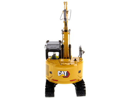 CAT Caterpillar 315 Track Type Hydraulic Excavator Yellow with Operator "High Line" Series 1/50 Diecast Model by Diecast Masters-Diecast Masters-ModelCars.com