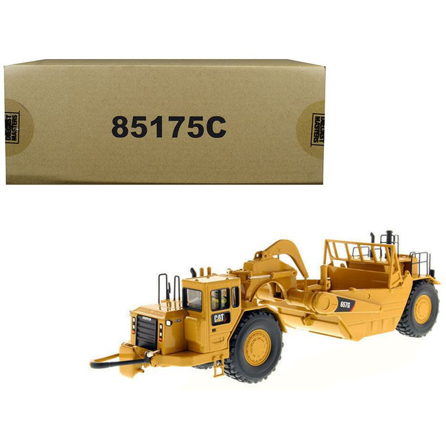 CAT Caterpillar 657 G Wheel Tractor Scraper with Operator "Core Classics Series" 1/50 Diecast Model by Diecast Masters-Diecast Masters-ModelCars.com