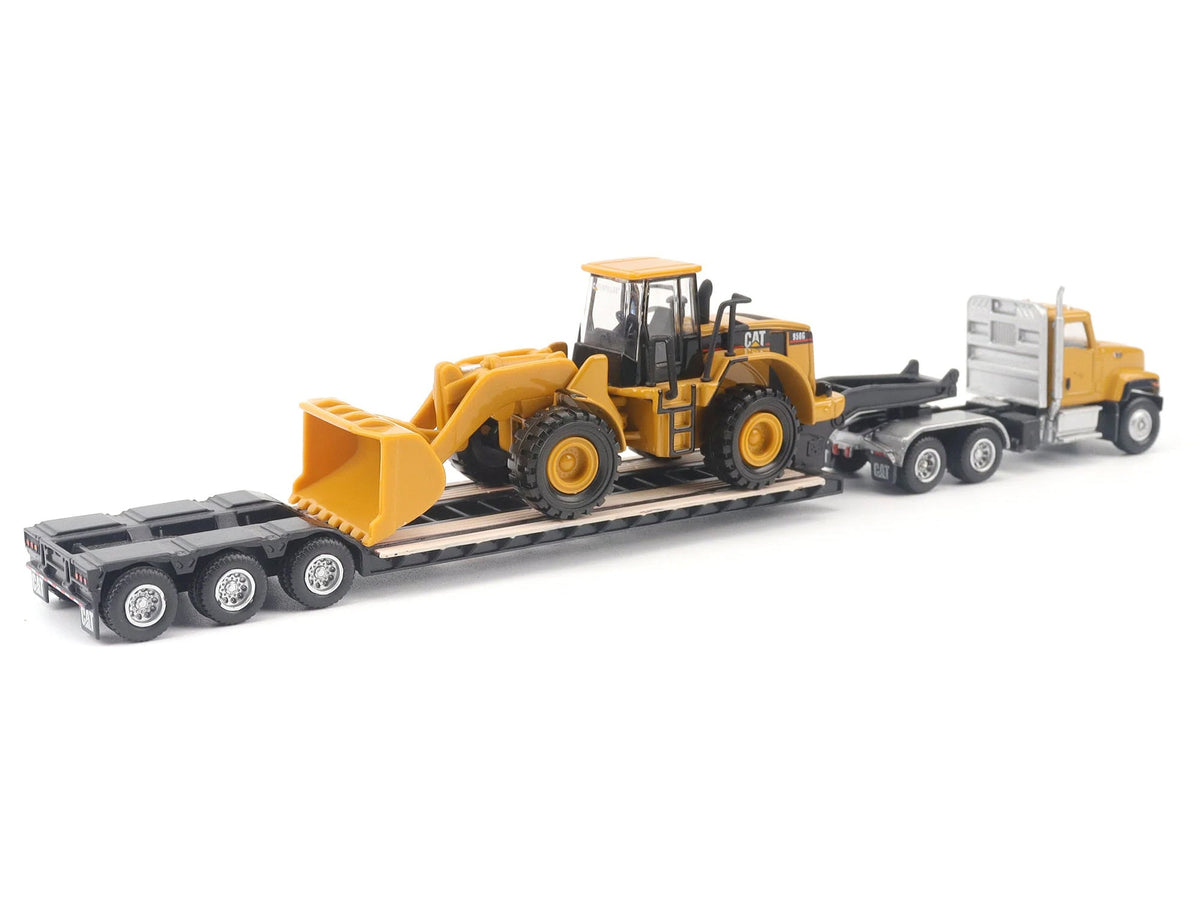 CAT Caterpillar CT681 Day Cab Tractor Yellow with Lowboy Trailer and CAT 950G Wheel Loader Yellow 1/87 (HO) Diecast Model by Diecast Masters-Diecast Masters-ModelCars.com