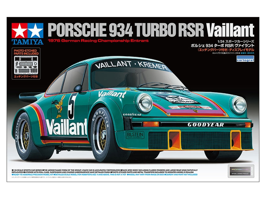 Model of a green Porsche race car with sponsor logos.