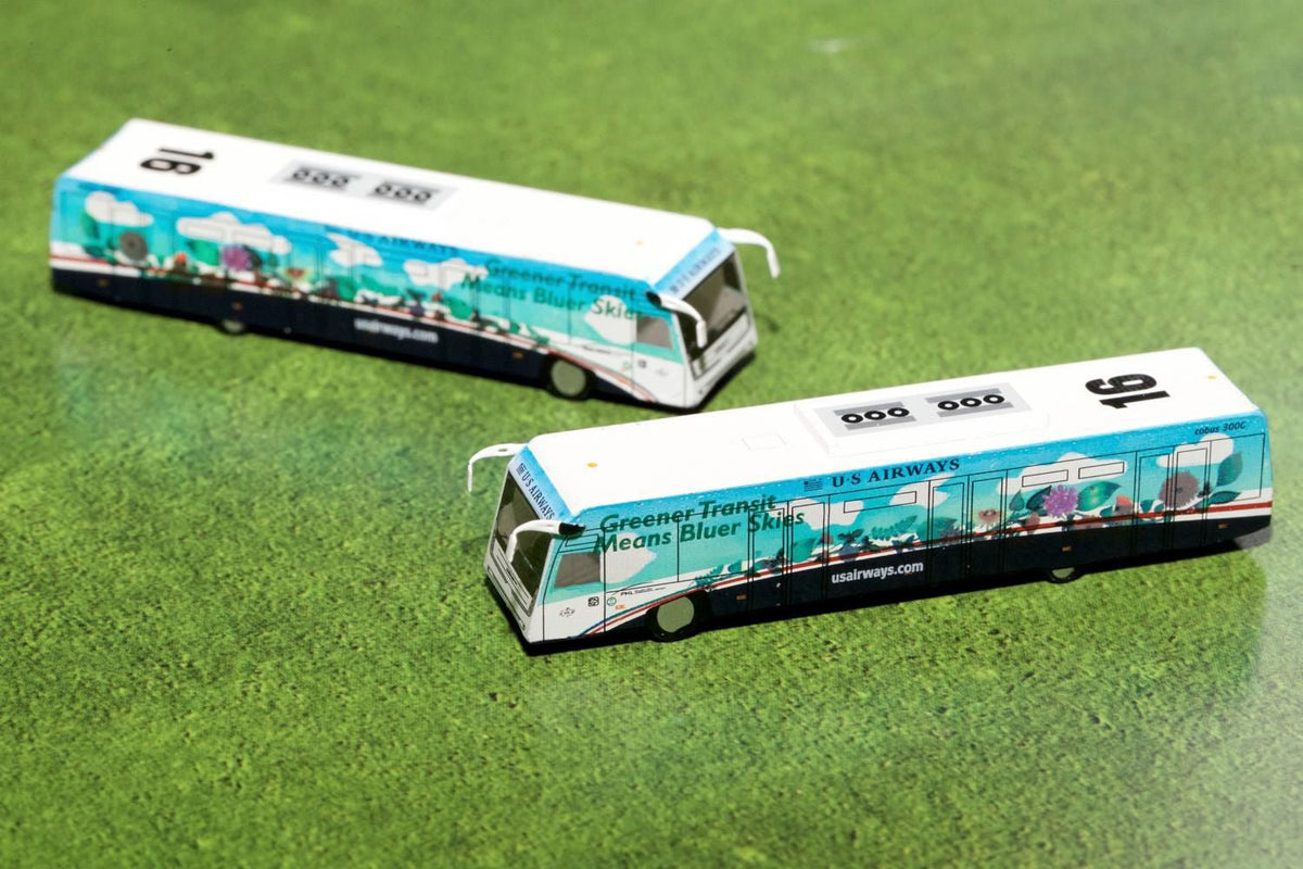 Cobus 3000 Passenger Bus White and Blue with Graphics "US Airways Shuttle Bus - Greener Transit" 2 Piece Set "Gemini 200" Series Diecast Models by GeminiJets-GeminiJets-ModelCars.com
