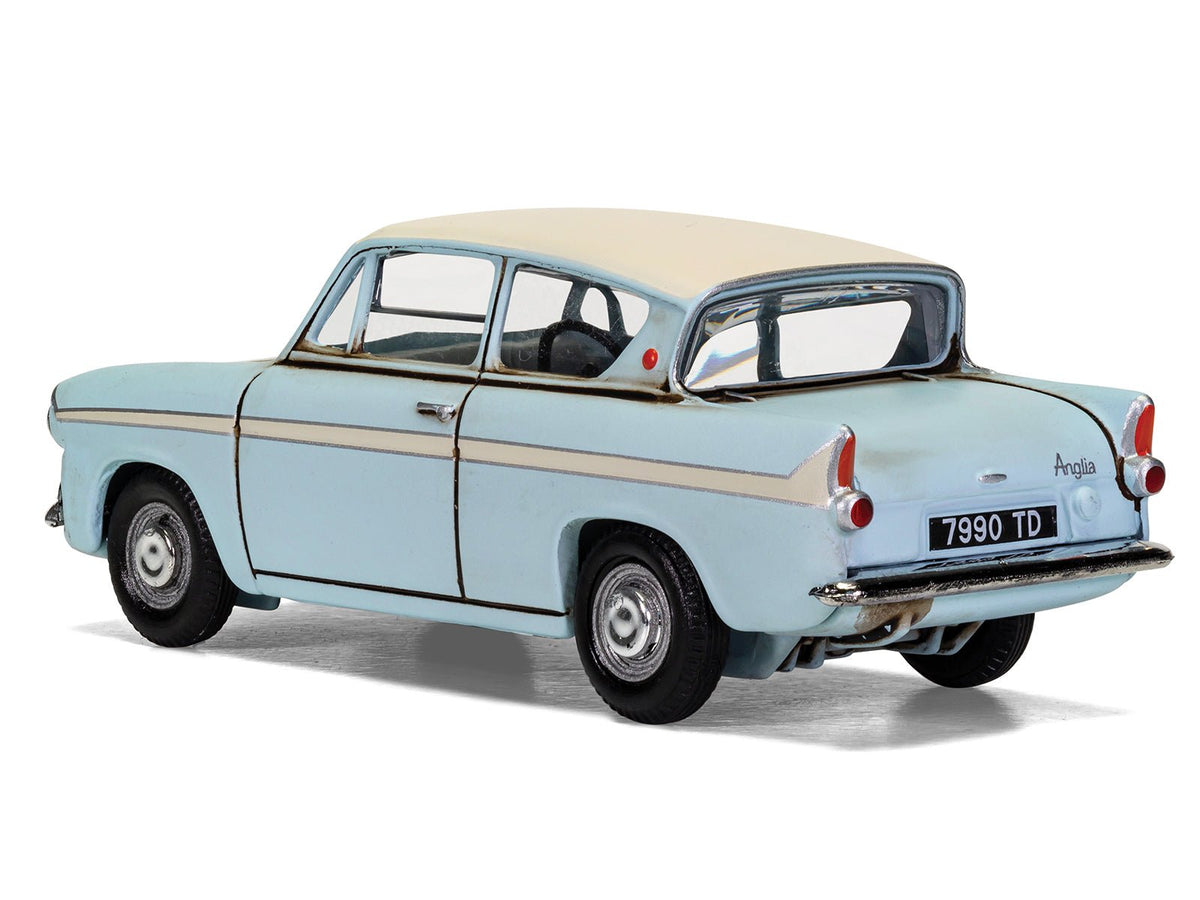 Flying Ford Anglia RHD (Right Hand Drive) Light Blue with White Top (Weathered) with Harry and Ron Figures "Harry Potter" Movie Series Diecast Model by Corgi-Corgi-ModelCars.com