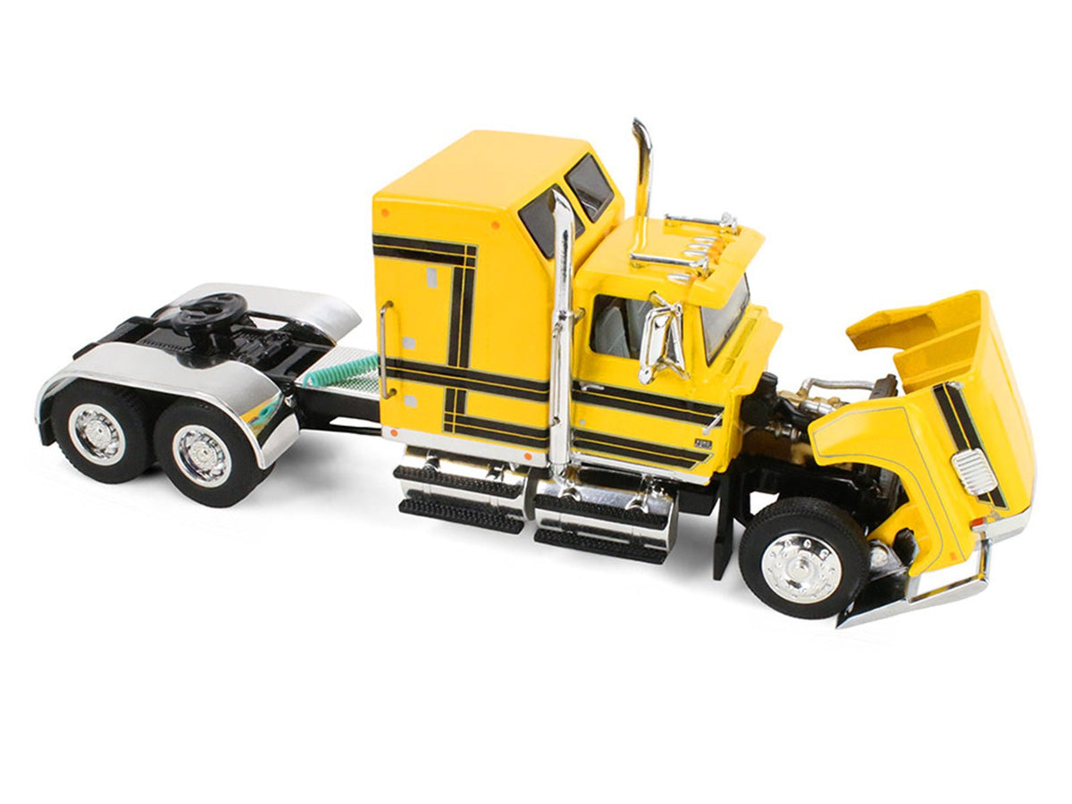 Ford LTL 9000 with 60" Aerodyne Sleeper and 53' Wilson Roadbrute Flatbed Trailer with Covered Wagon Yellow with Black Stripes 1/64 Diecast Model by DCP/First Gear-First Gear-ModelCars.com
