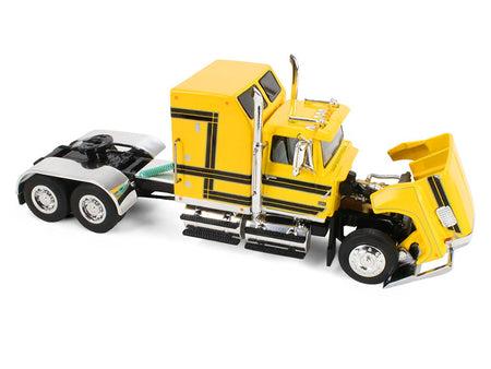 Ford LTL 9000 with 60" Aerodyne Sleeper and 53' Wilson Roadbrute Flatbed Trailer with Covered Wagon Yellow with Black Stripes 1/64 Diecast Model by DCP/First Gear-First Gear-ModelCars.com