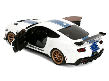Ford Mustang Shelby Super Snake White Metallic with Blue Stripes and Gold Wheels "Pink Slips" Series 1/18 Diecast Model Car by Jada-Jada-ModelCars.com