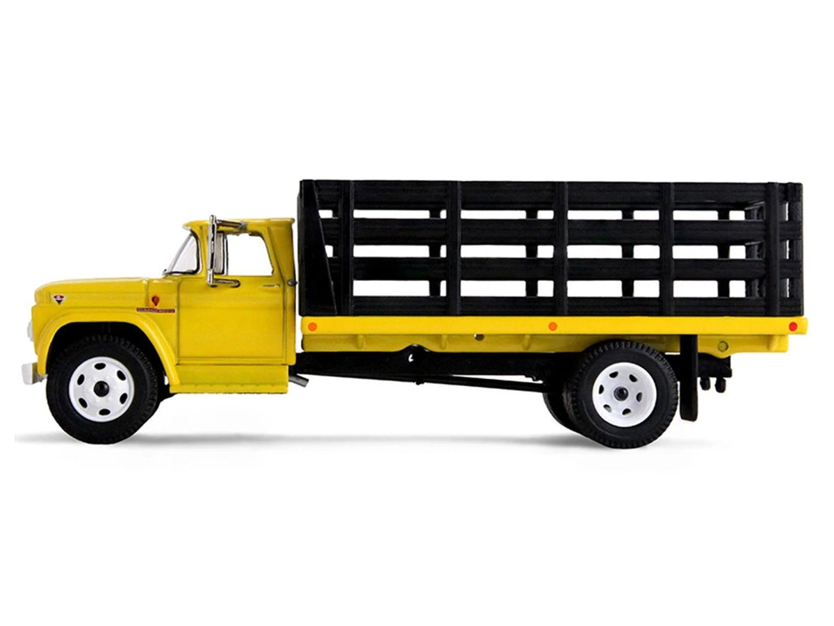 GMC 4000 Stake Truck Bright Yellow 1/64 Diecast Model by DCP/First Gear-First Gear-ModelCars.com