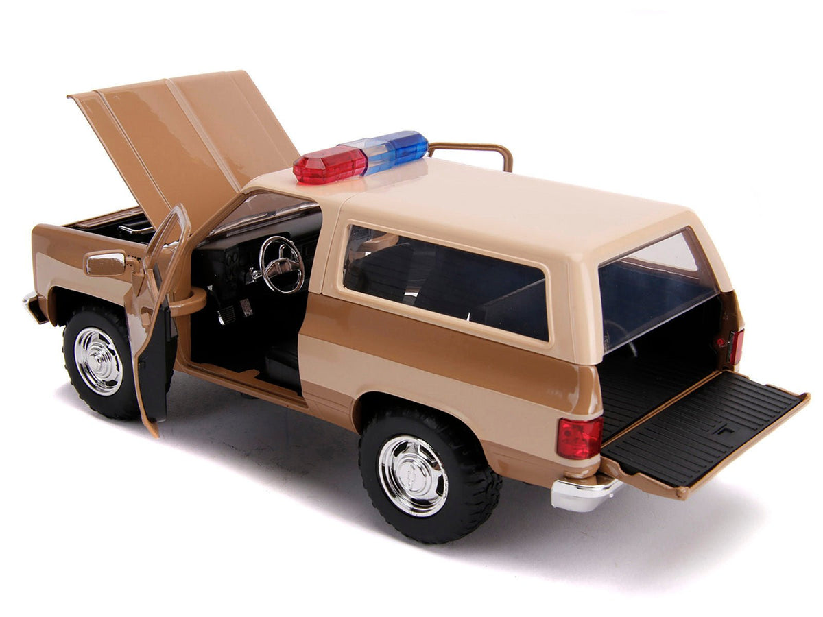 Hopper's Chevrolet Blazer with Police Badge "Hawkins Police Dept." "Stranger Things" (2016) TV Series 1/24 Diecast Model Car by Jada-Jada-ModelCars.com
