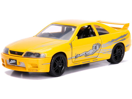 Leon's Nissan Skyline GT-R (BCNR33) Yellow Metallic with Graphics "Fast & Furious" Series 1/32 Diecast Model Car by Jada-Jada-ModelCars.com